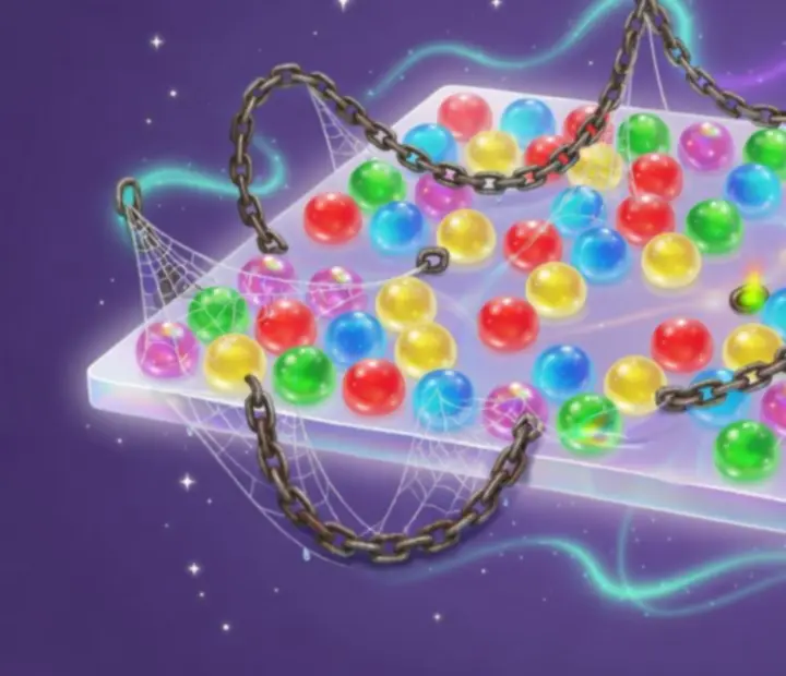 Lehká pavučinová překážka z Bubble Witch 3 Saga obepínající bubliny